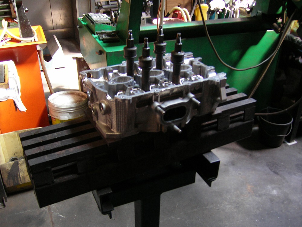 Straightening a Bent Cylinder Head. Engine Machining.